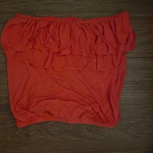 Strapless crop top with open back. Size small but fits as a medium.